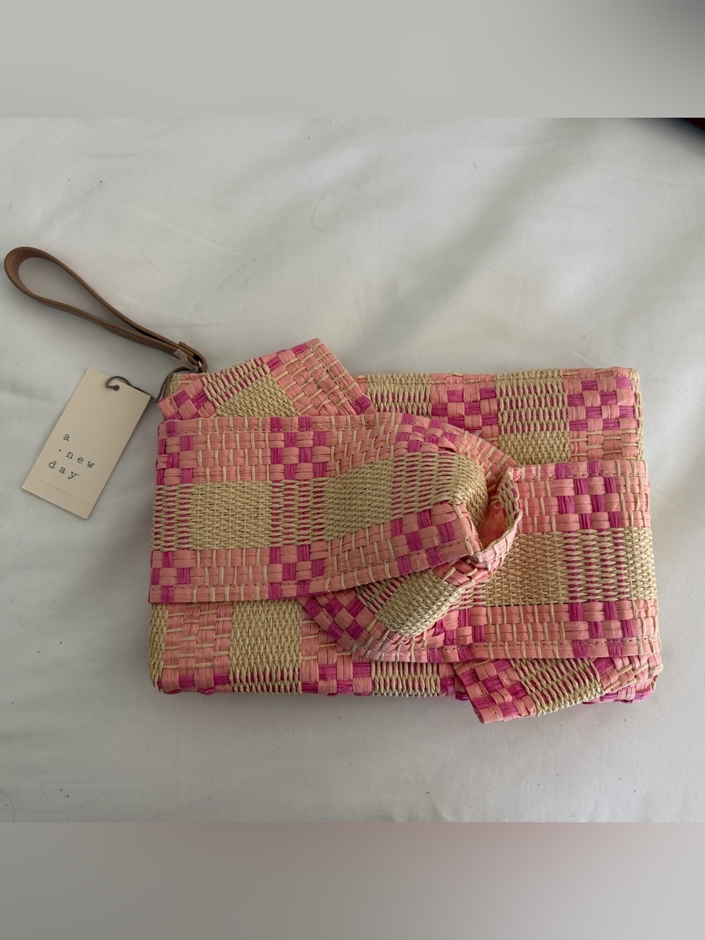a new day Pink & Natural Woven Clutch with Knot Detail